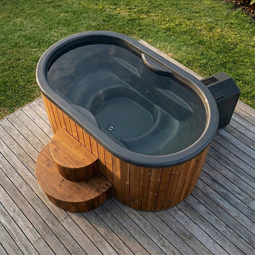 Top-down view of the SaunaLife S2N tub interior showing the two-person contoured fiberglass seating