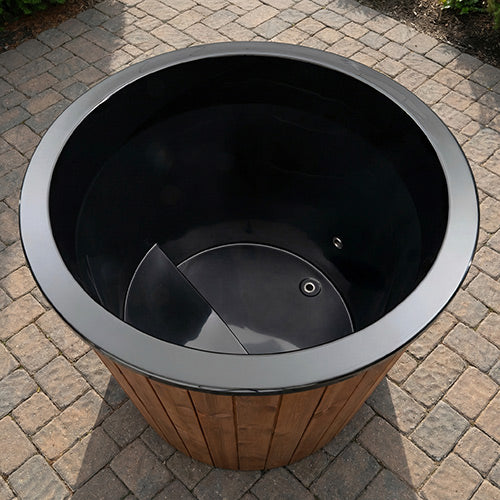Top-down view of the SaunaLife S1N tub interior showing the contoured fiberglass liner and seat