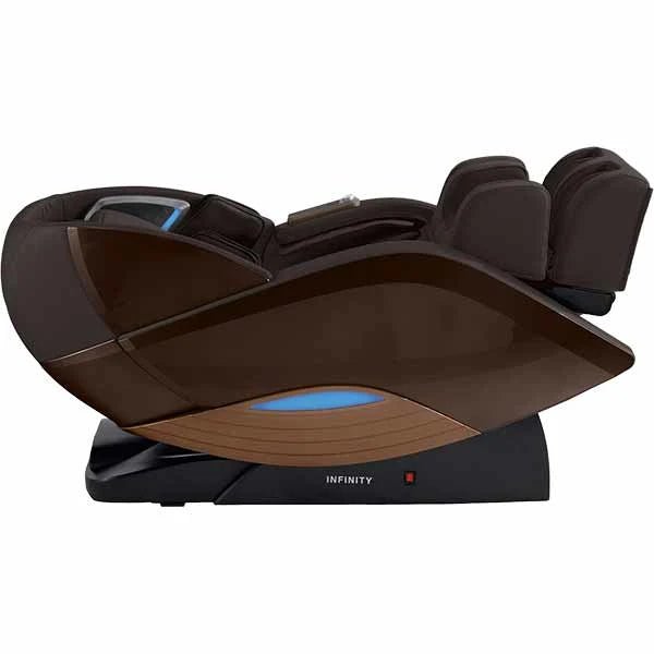 Infinity Dynasty 4D massage chair in brown shown in Zero Gravity recline highlighting L-Track roller coverage, spinal decompression, and full body air compression massage