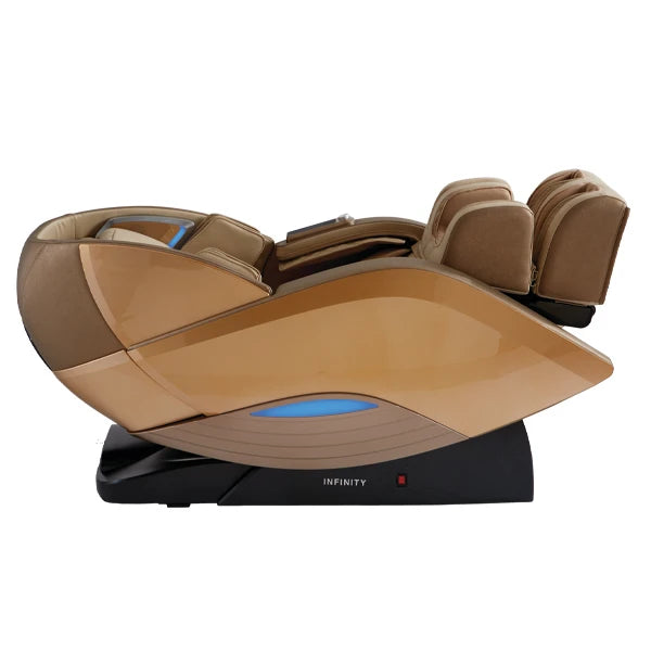 Infinity Dynasty 4D massage chair in gold and tan displayed in Zero Gravity position featuring L-Track roller coverage, spinal decompression, full body air compression, and foot reflexology massage