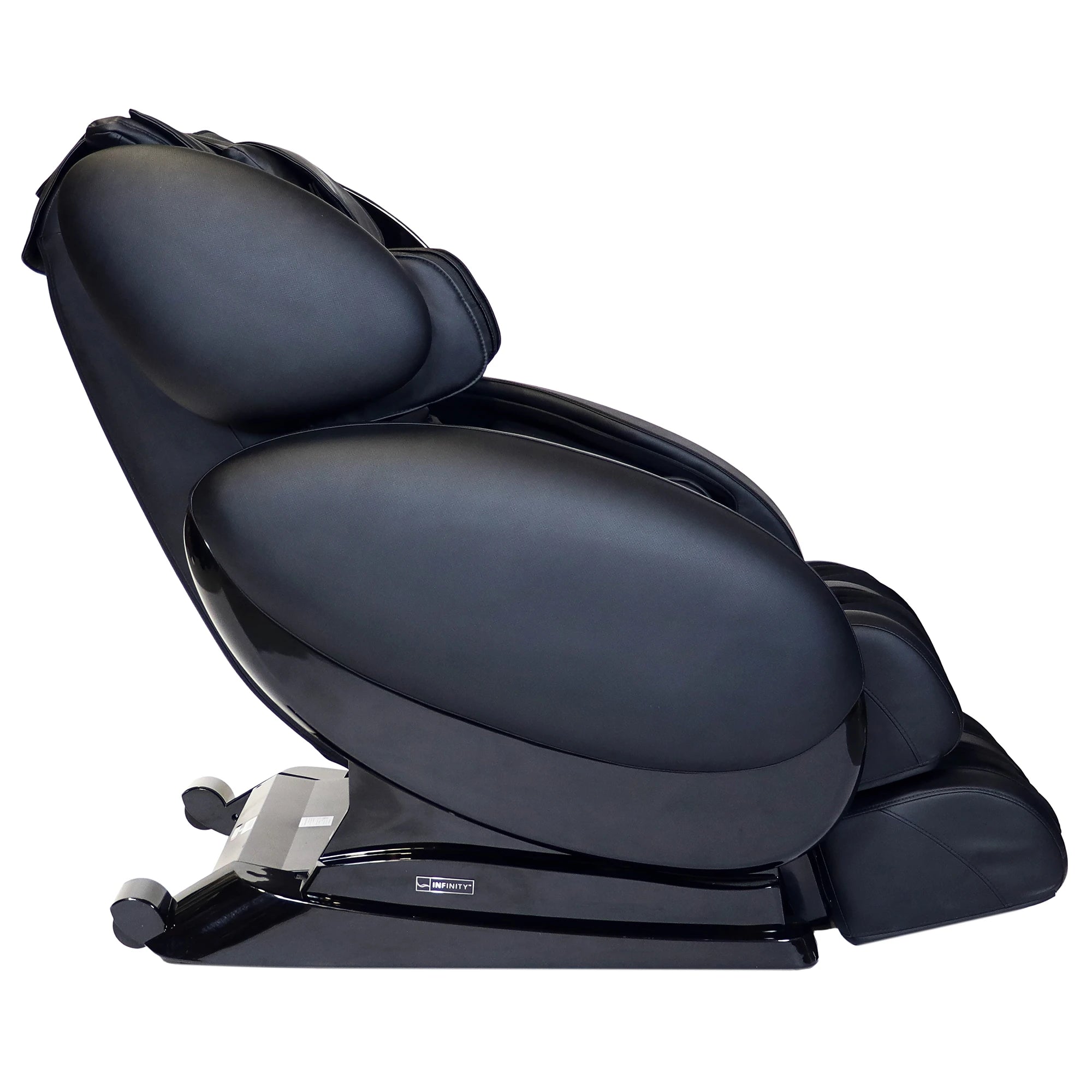 Side angle view of the Infinity IT-8500 Plus massage chair in black shown in a reclined Zero Gravity position