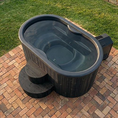 Top-down view of the SaunaLife S2B tub interior showing the two-person contoured fiberglass seating