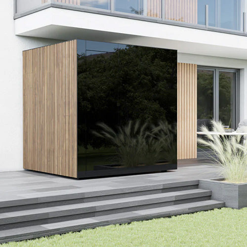 ThermaSol Spectra outdoor sauna cabin in modern landscaped backyard setting
