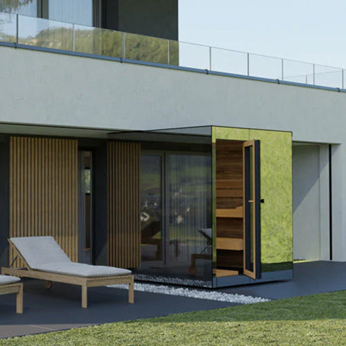 ThermaSol Vue outdoor sauna cabin with mirrored glass exterior installed on modern luxury home patio backyard setting