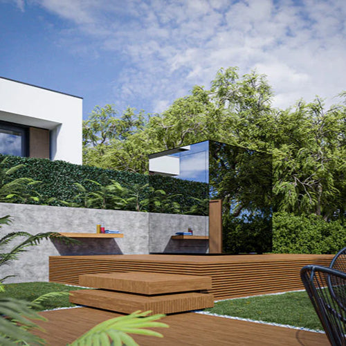 ThermaSol Vue mirrored glass outdoor sauna installed beside modern wooden deck in landscaped backyard setting